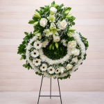 Corona condolencia con moño de flores
